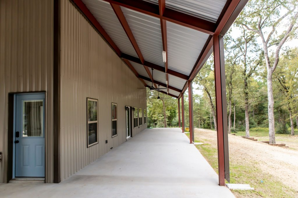 College Station Barndominium Home Builder with covered back porch