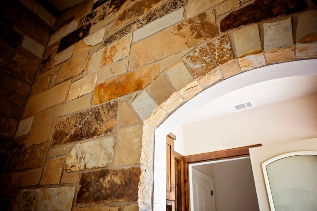 Huntsville Texas New Home Builder with Archway and Stone Accents