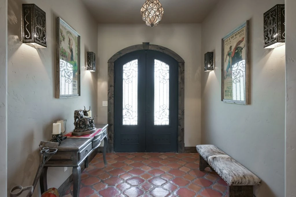 Huntsville Home Builder for Hacienda Spanish Style foyer facing front door entrance