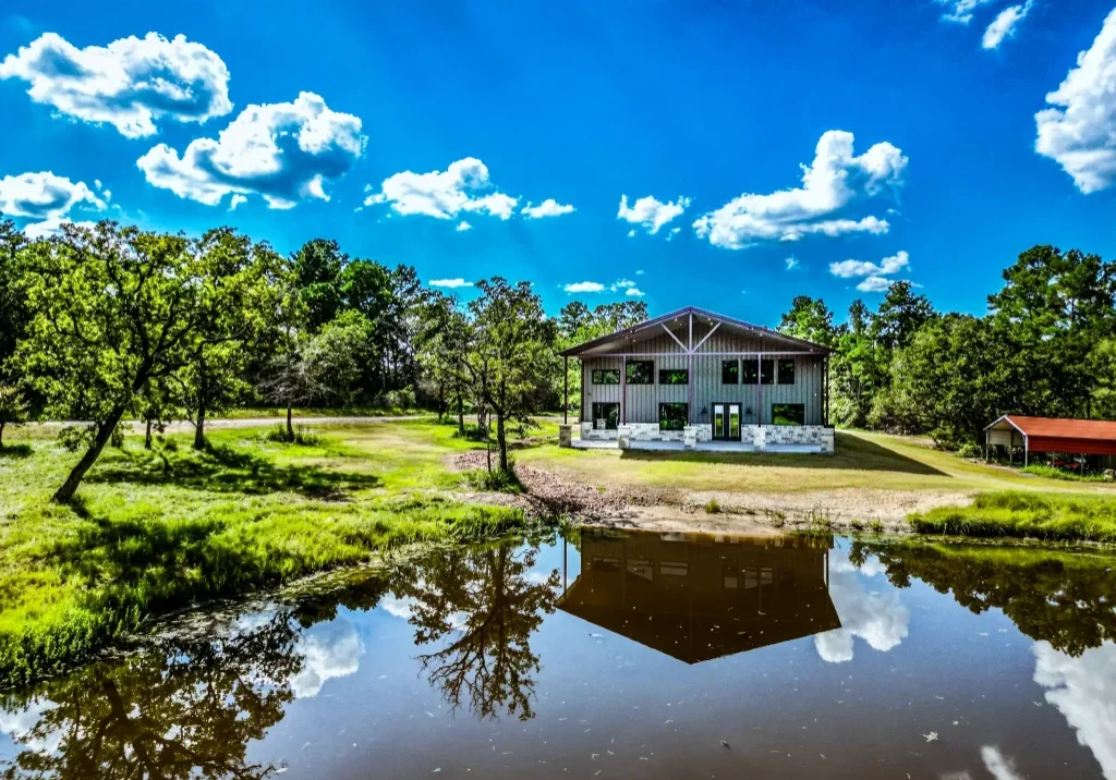 Barndominium Builder in Huntsville front facing pond